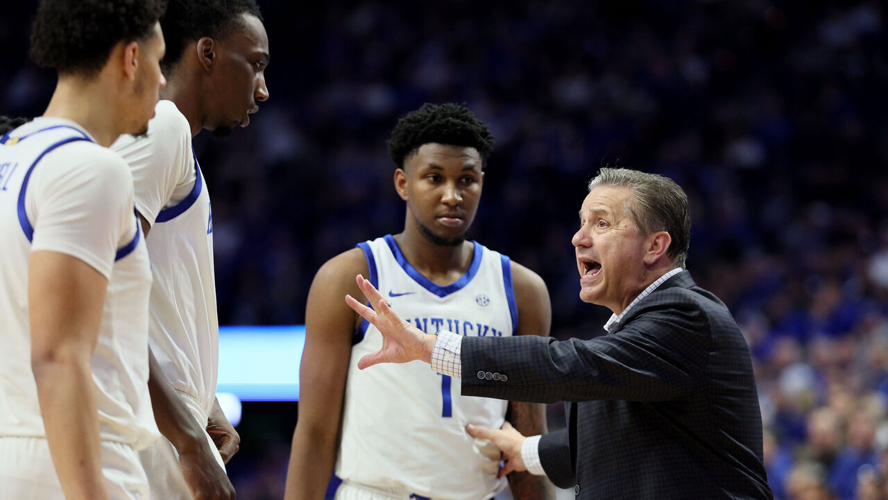 LEXINGTON, KENTUCKY - JANUARY 09: John Calipari the head coach of the Kentucky Wildcats gives instructions to his team against the Missouri Tigers at Rupp Arena on January 09, 2024 in Lexington, Kentucky.