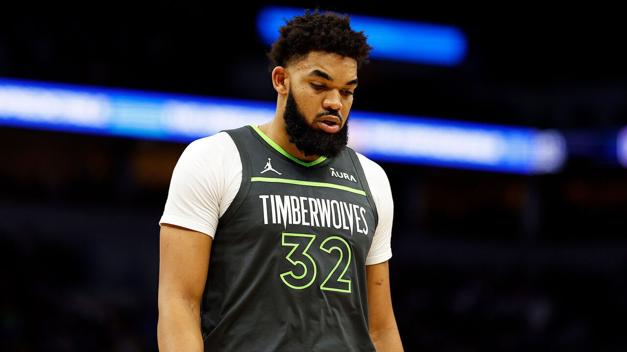 MINNEAPOLIS, MINNESOTA - JANUARY 22: Karl-Anthony Towns #32 of the Minnesota Timberwolves looks on against the Charlotte Hornets in the second quarter at Target Center on January 22, 2024 in Minneapolis, Minnesota.