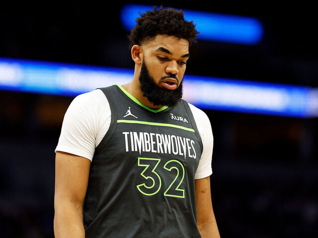 MINNEAPOLIS, MINNESOTA - JANUARY 22: Karl-Anthony Towns #32 of the Minnesota Timberwolves looks on against the Charlotte Hornets in the second quarter at Target Center on January 22, 2024 in Minneapolis, Minnesota.