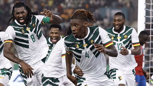 Cameroon's defender #4 Christopher Wooh celebrates scoring his team's third goal during the Africa Cup of Nations (CAN) 2024 group C football match between Gambia and Cameroon at Stade de la Paix in Bouake on January 23, 2024.