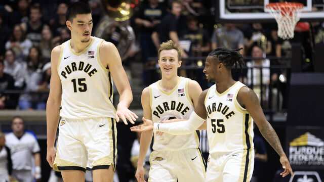 WEST LAFAYETTE, INDIANA - DECEMBER 21: Zach Edey #15, Fletcher Loyer #2 and Lance Jones #55 of the Purdue Boilermakers react in the game against the Jacksonville Dolphins at Mackey Arena on December 21, 2023 in West Lafayette, Indiana.