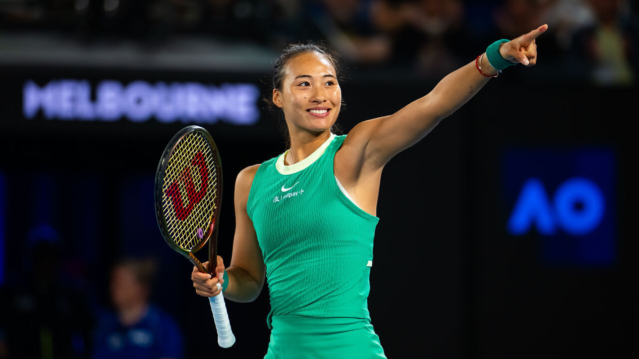 MELBOURNE, AUSTRALIA - JANUARY 24: Qinwen Zheng of China celebrates defeating Anna Kalinskaya in the quarter-final on Day 11 of the 2024 Australian Open at Melbourne Park on January 24, 2024 in Melbourne, Australia