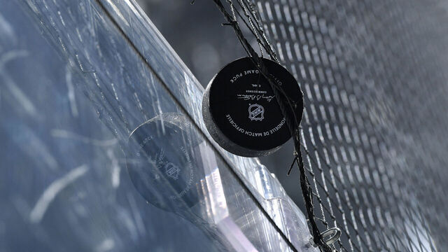 LOS ANGELES, CA - JANUARY 22: A detail shot of the official game puck stuck in the net during the first period between the San Jose Sharks and the Los Angeles Kings at Crypto.com Arena on January 22, 2024 in Los Angeles, California.