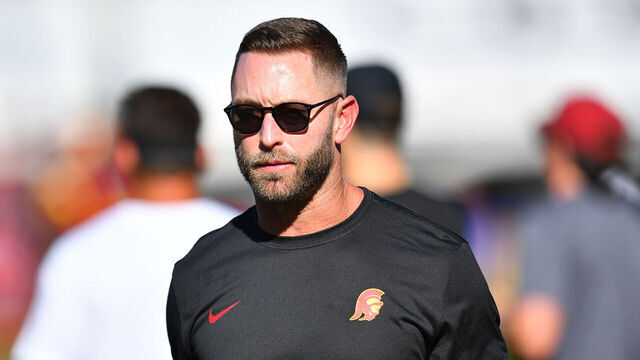 LOS ANGELES, CA - AUGUST 26: USC Trojans senior offensive analyst Kliff Kingsbury looks on before a game between the San Jose State Spartans and the USC Trojans on August 26, 2023, at Los Angeles Memorial Coliseum in Los Angeles, CA.