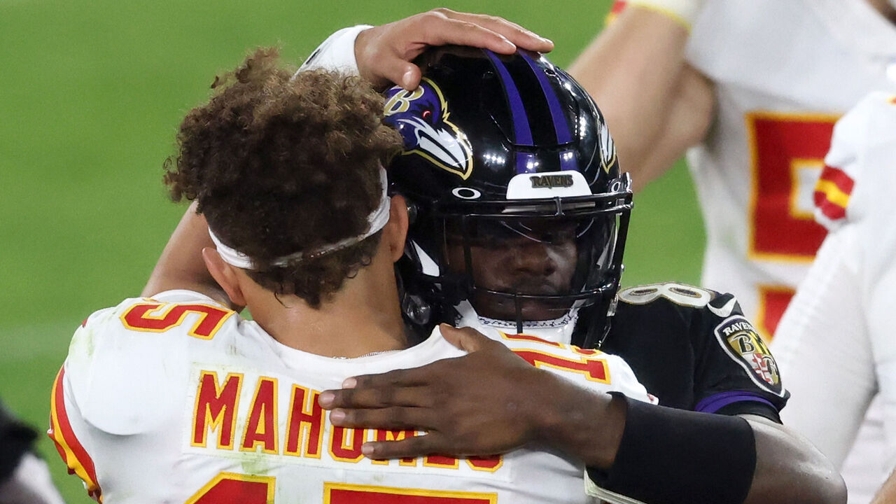 BALTIMORE, MARYLAND - SEPTEMBER 28: Quarterbacks Patrick Mahomes #15 of the Kansas City Chiefs and Lamar Jackson #8 of the Baltimore Ravens hug following the Chiefs win at M&T Bank Stadium on September 28, 2020 in Baltimore, Maryland.