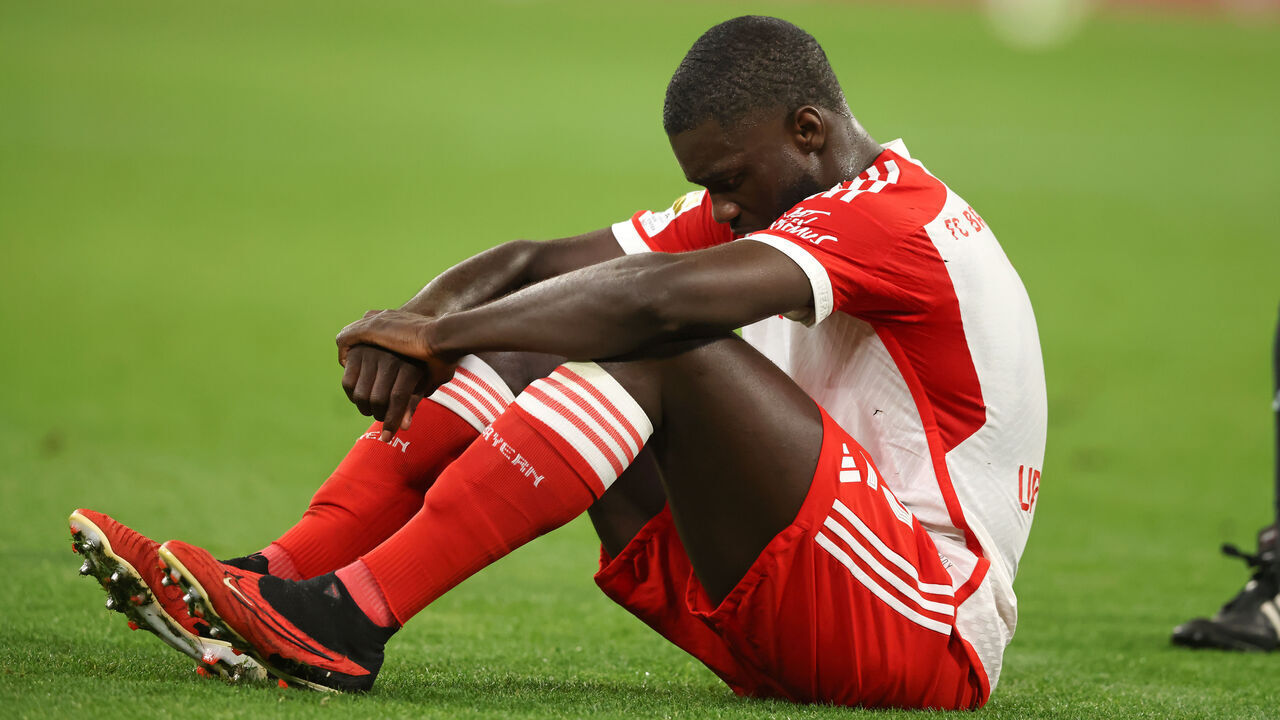MUNICH, GERMANY - JANUARY 24: Dayot Upamecano of FC Bayern Muenchen is injured in the match and has to be substituted during the Bundesliga match between FC Bayern München and 1. FC Union Berlin at Allianz Arena on January 24, 2024 in Munich, Germany.