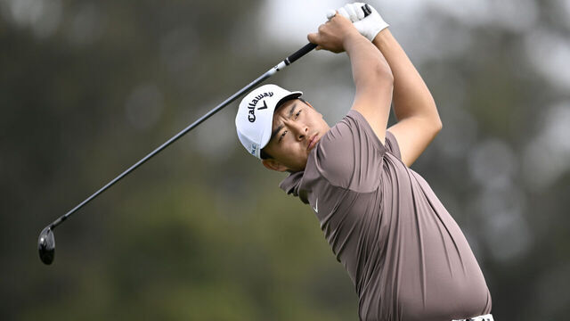 LA JOLLA, CALIFORNIA - JANUARY 24: Kevin Yu of Taiwan hits his shot from the third tee during the first round of the Farmers Insurance Open on the Torrey Pines North Course on January 24, 2024 in La Jolla, California.