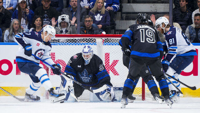 TORONTO, ON - JANUARY 24: Ilya Samsonov #35 of the Toronto Maple Leafs makes a save as Vladislav Namestnikov #7 of the Winnipeg Jets goes to the net during the first period at Scotiabank Arena on January 24, 2024 in Toronto, Ontario, Canada.