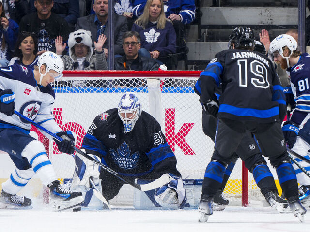 TORONTO, ON - JANUARY 24: Ilya Samsonov #35 of the Toronto Maple Leafs makes a save as Vladislav Namestnikov #7 of the Winnipeg Jets goes to the net during the first period at Scotiabank Arena on January 24, 2024 in Toronto, Ontario, Canada.