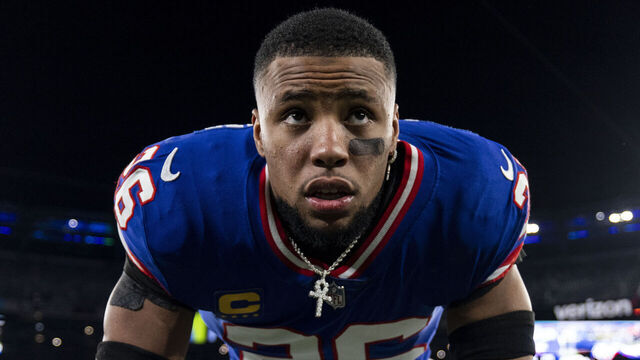 EAST RUTHERFORD, NEW JERSEY - DECEMBER 11: Saquon Barkley #26 of the New York Giants looks on as he stretches prior to an NFL football game between the New York Giants and the Green Bay Packers at MetLife Stadium on December 11, 2023 in East Rutherford, New Jersey.