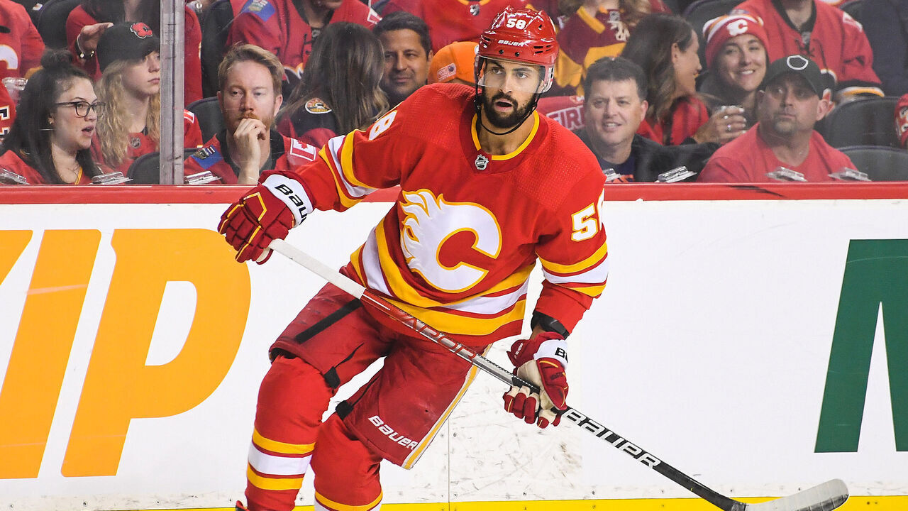 CALGARY, AB - MAY 20: Oliver Kylington #58 of the Calgary Flames in action against the Edmonton Oilers during Game Two of the Second Round of the 2022 Stanley Cup Playoffs at Scotiabank Saddledome on May 20, 2022 in Calgary, Alberta, Canada. The Oilers defeated the Flames 5-3.