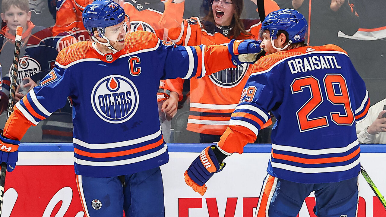 EDMONTON, AB - NOVEMBER 13: Edmonton Oilers Center Connor McDavid (97) and Edmonton Oilers Center Leon Draisaitl (29) celebrate a goal in the third period of the Edmonton Oilers game versus the New York Islanders on November 13, 2023 at Rogers Place in Edmonton, AB.