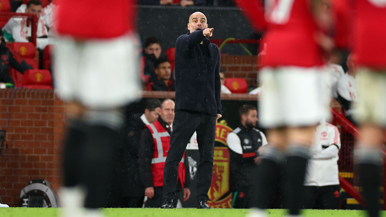 MANCHESTER, ENGLAND - OCTOBER 29: Pep Guardiola the head coach / manager of Manchester City during the Premier League match between Manchester United and Manchester City at Old Trafford on October 29, 2023 in Manchester, England.