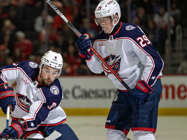 DETROIT, MI - NOVEMBER 11: Ivan Provorov #9 of the Columbus Blue Jackets in front of Patrik Laine #29 during the second period against the Detroit Red Wings at Little Caesars Arena on November 11, 2023 in Detroit, Michigan. Detroit defeated Columbus 5-4.