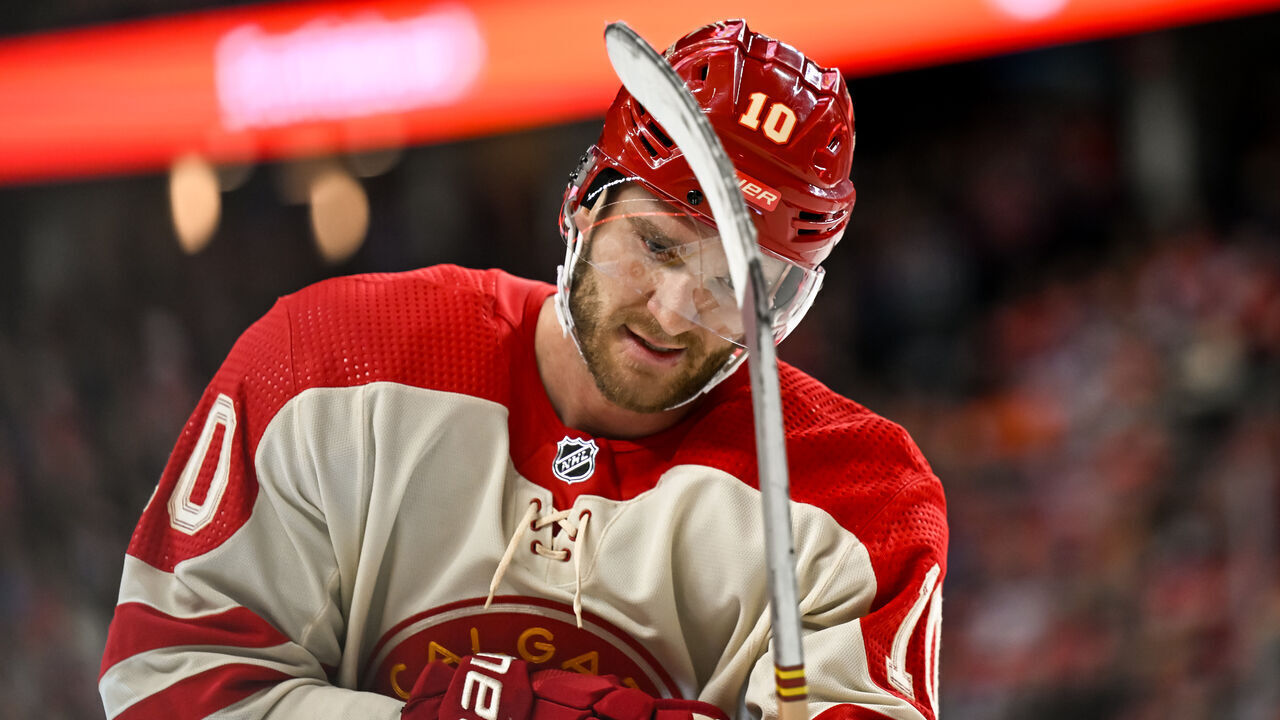 CALGARY, AB - JANUARY 20: Calgary Flames Left Wing Jonathan Huberdeau (10) looks on during the third period of an NHL game between the Calgary Flames and the Edmonton Oilers on January 20, 2024, at the Scotiabank Saddledome in Calgary, AB.