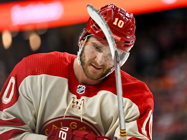 CALGARY, AB - JANUARY 20: Calgary Flames Left Wing Jonathan Huberdeau (10) looks on during the third period of an NHL game between the Calgary Flames and the Edmonton Oilers on January 20, 2024, at the Scotiabank Saddledome in Calgary, AB.