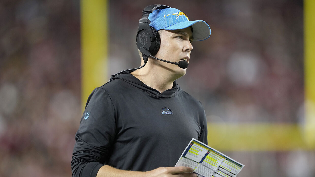 SANTA CLARA, CALIFORNIA - AUGUST 25: Offensive coordinator Kellen Moore of the Los Angeles Chargers looks on from the sidelines against the San Francisco 49ers during the third quarter of a preseason game at Levi's Stadium on August 25, 2023 in Santa Clara, California.