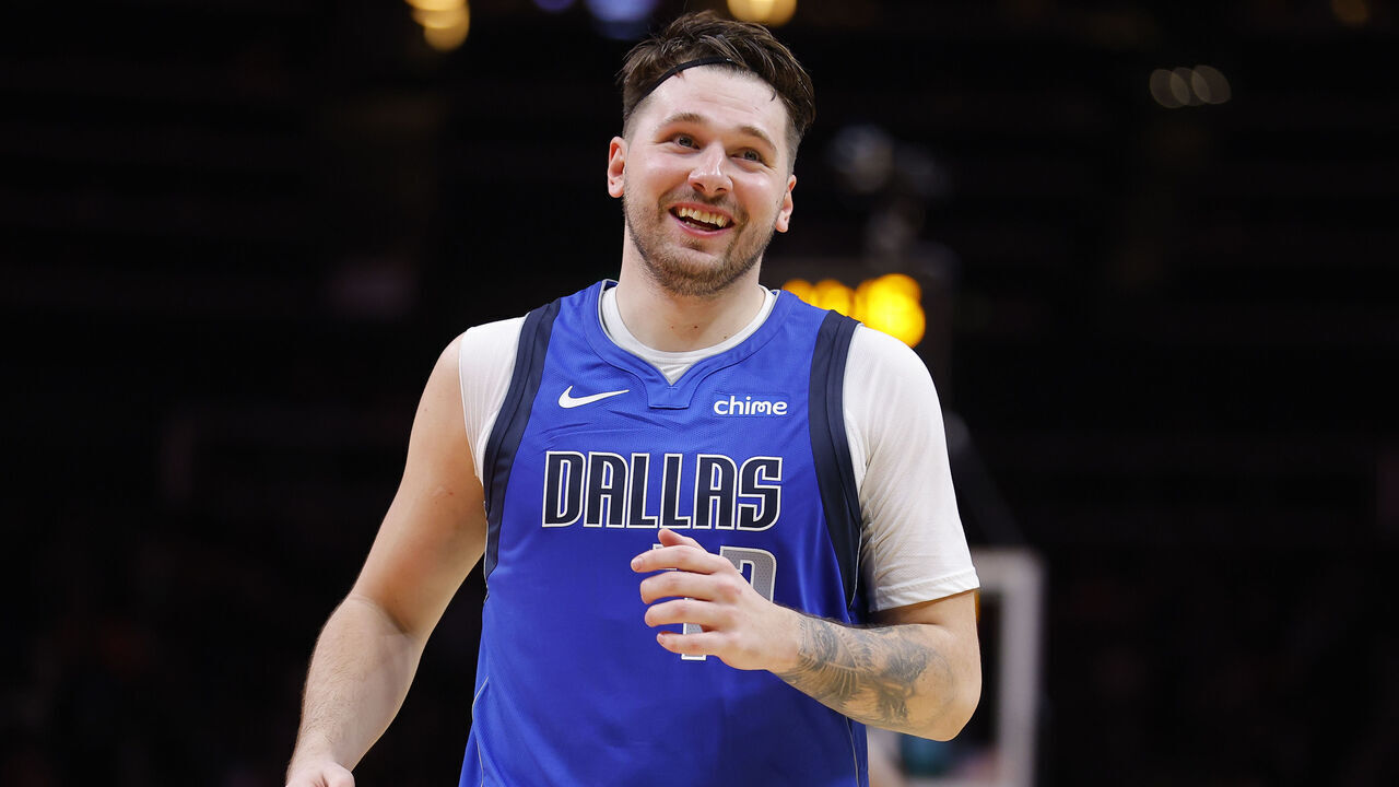 ATLANTA, GEORGIA - JANUARY 26: Luka Doncic #77 of the Dallas Mavericks reacts during the fourth quarter against the Atlanta Hawks at State Farm Arena on January 26, 2024 in Atlanta, Georgia.