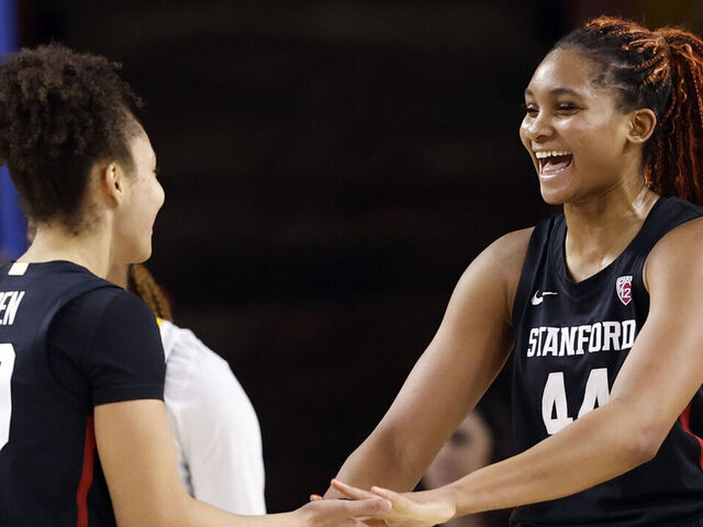 TEMPE, ARIZONA - JANUARY 26: Kiki Iriafen #44 of the Stanford Cardinal celebrates with Courtney Ogden #40 after a basket during the second half against the Arizona State Sun Devils at Desert Financial Arena on January 26, 2024 in Tempe, Arizona.
