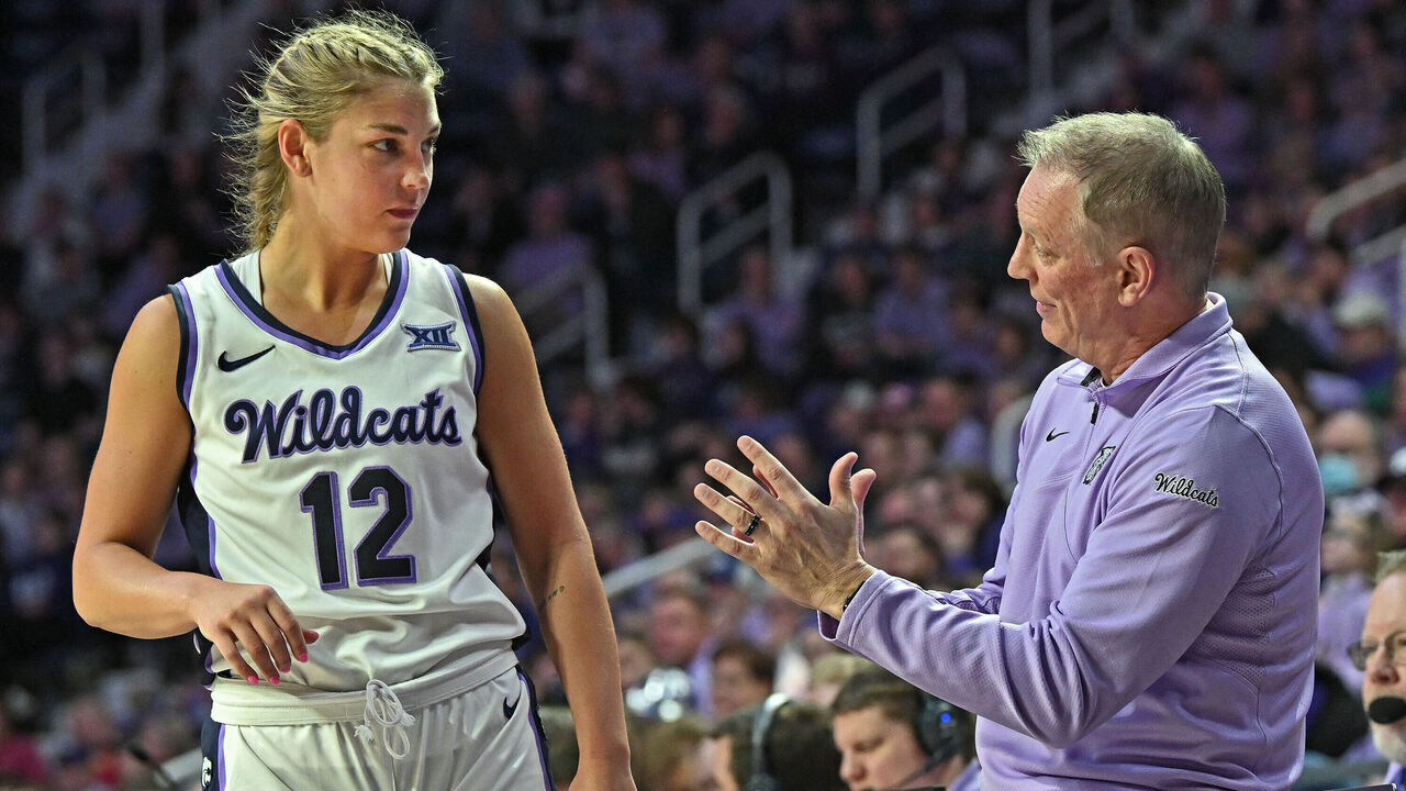 MANHATTAN, KS - JANUARY 20: Head coach Jeff Mittie (R)of the Kansas State Wildcats instructs Gabby Gregory #12 in the first half against the Kansas Jayhawks at Bramlage Coliseum on January 20, 2024 in Manhattan, Kansas.