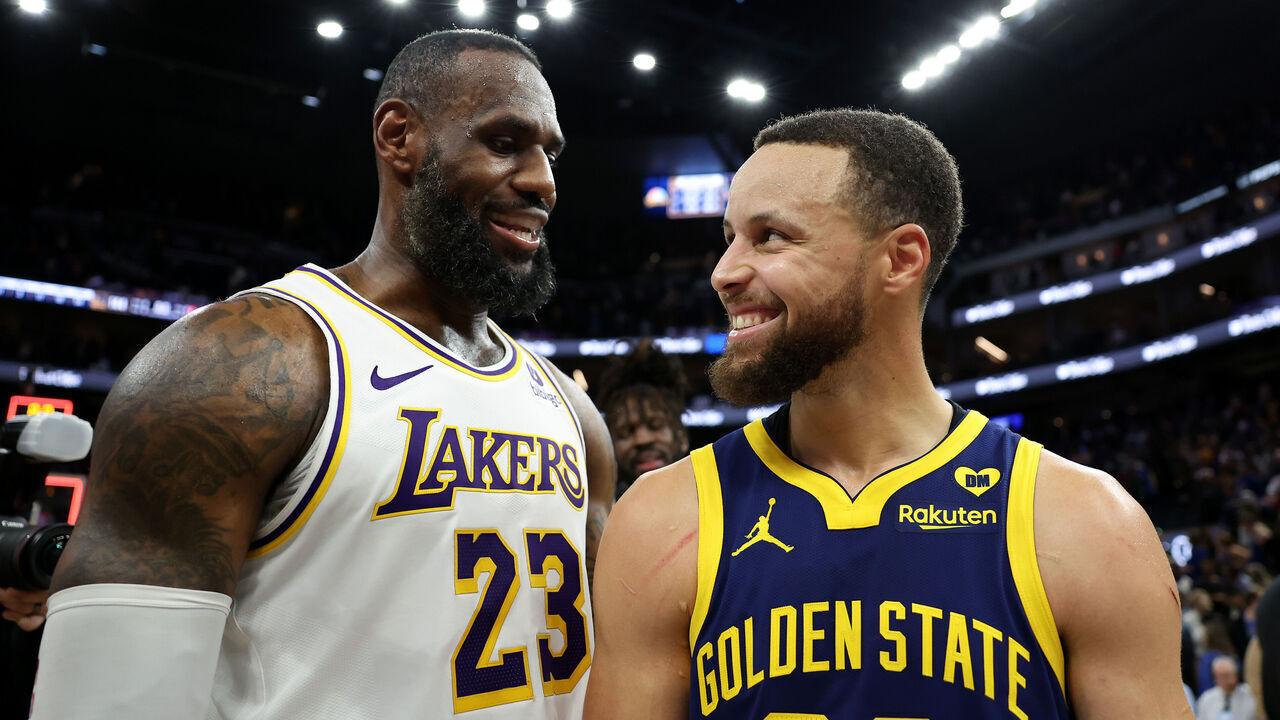SAN FRANCISCO, CALIFORNIA - JANUARY 27: LeBron James #23 of the Los Angeles Lakers and Stephen Curry #30 of the Golden State Warriors talk to each other after the Lakers beat the Warriors in double overtime at Chase Center on January 27, 2024 in San Francisco, California.