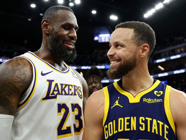 SAN FRANCISCO, CALIFORNIA - JANUARY 27: LeBron James #23 of the Los Angeles Lakers and Stephen Curry #30 of the Golden State Warriors talk to each other after the Lakers beat the Warriors in double overtime at Chase Center on January 27, 2024 in San Francisco, California.