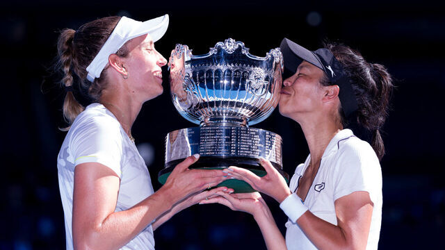MELBOURNE, AUSTRALIA - JANUARY 28: Su-Wei Hsieh (R) of Chinese Taipei and Elise Mertens of Belgium kiss the championship trophy after winning their Women’s Doubles Finals match against Lyudmyla Kichenok of Ukraine and Jelena Ostapenko of Latvia during the 2024 Australian Open at Melbourne Park on January 28, 2024 in Melbourne, Australia.