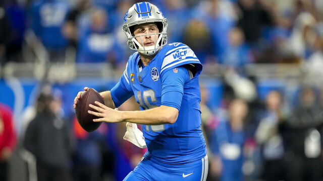 DETROIT, MICHIGAN - JANUARY 21: Jared Goff #16 of the Detroit Lions passes the ball against the Tampa Bay Buccaneers at Ford Field on January 21, 2024 in Detroit, Michigan.