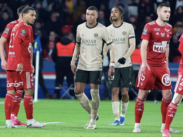 PARIS, FRANCE - JANUARY 28: Kylian Mbappe #7 and Bradley Barcola #29 of Paris Saint-Germain are dissapointed after the Ligue 1 Uber Eats match between Paris Saint-Germain and Stade Brestois 29 at Parc des Princes on January 28, 2024 in Paris, France.
