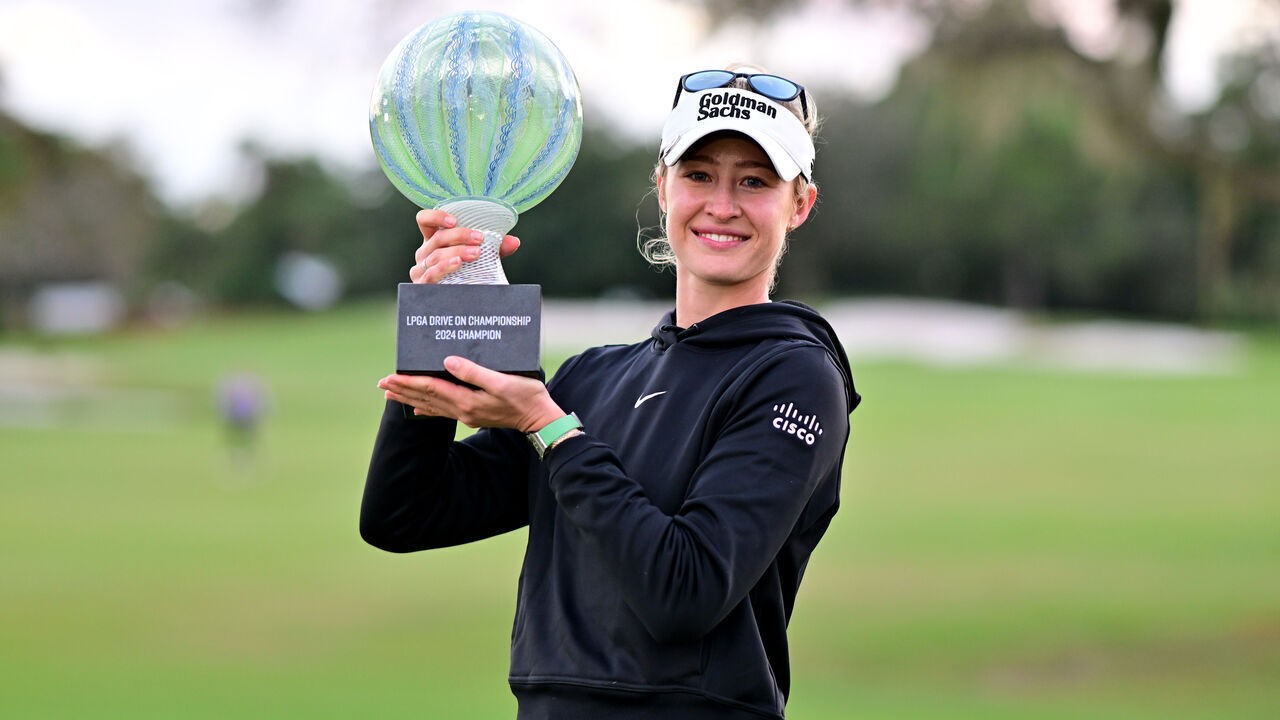 BRADENTON, FLORIDA - JANUARY 28: Nelly Korda of the United States poses with the championship trophy after a victory on the second play-off hole during the final round of the LPGA Drive On Championship at Bradenton Country Club on January 28, 2024 in Bradenton, Florida.