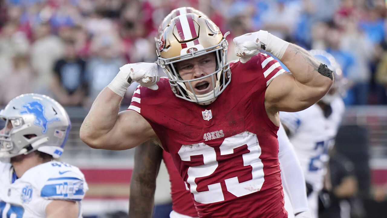 SANTA CLARA, CALIFORNIA - JANUARY 28: Christian McCaffrey #23 of the San Francisco 49ers celebrates after scoring a touchdown during the second quarter against the Detroit Lions in the NFC Championship Game at Levi's Stadium on January 28, 2024 in Santa Clara, California.