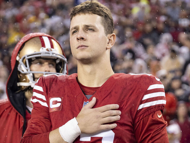SANTA CLARA, CALIFORNIA - JANUARY 20: Brock Purdy #13 of the San Francisco 49ers looks on during the national anthem prior to an NFL divisional round playoff football game between the San Francisco 49ers and the Green Bay Packers at Levi's Stadium on January 20, 2024 in Santa Clara, California.