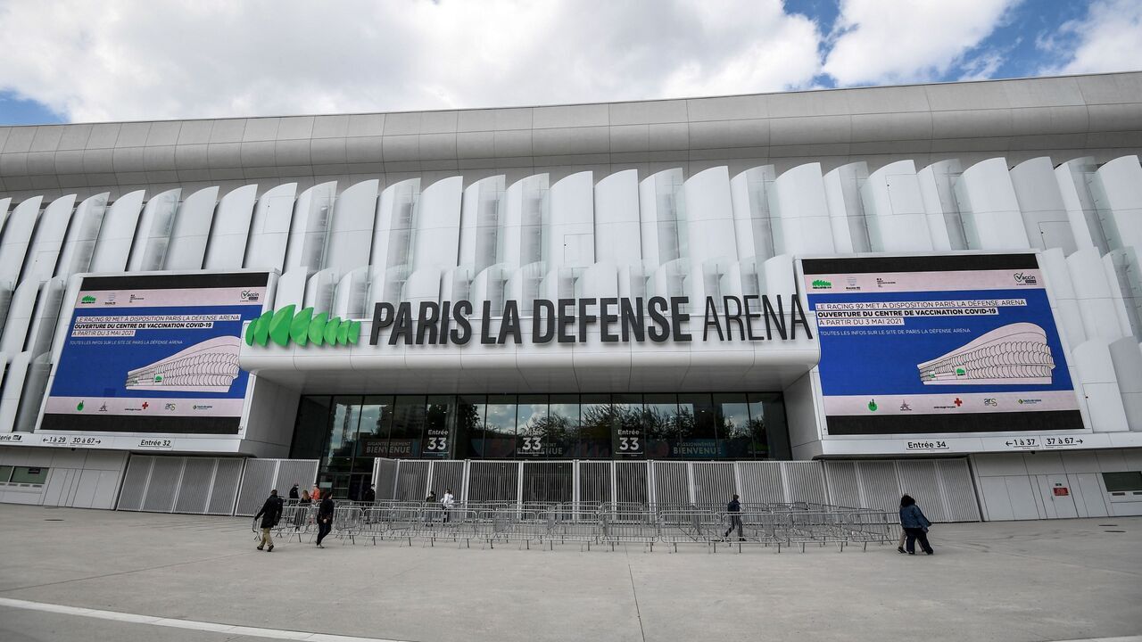 This picture taken on May 3, 2021 shows a general view of the entrance of the Covid-19 vaccination center in Paris La Defense Arena stadium in Nanterre, west of Paris.