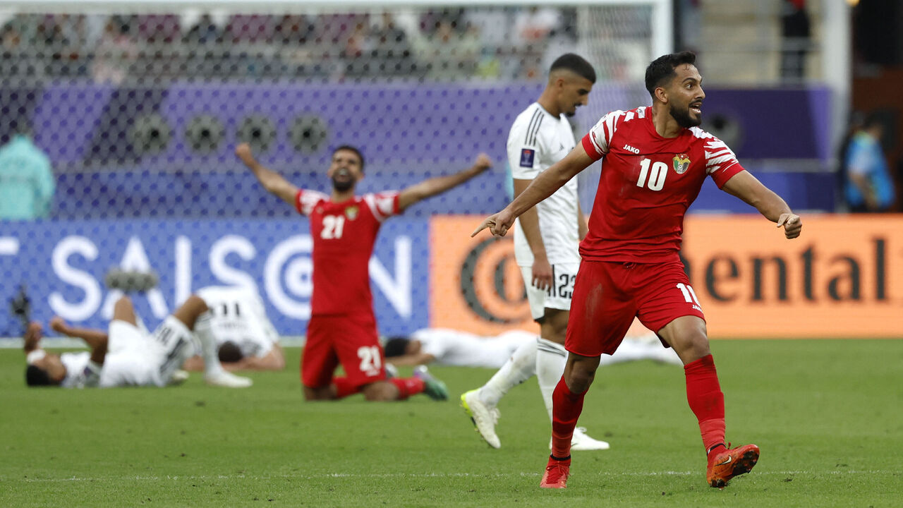 Jordan's midfielder #10 Musa al-Tamari celebrates his team's win at the end of the Qatar 2023 AFC Asian Cup football match between Iraq and Jordan at Khalifa International Stadium in Doha on January 29, 2024.