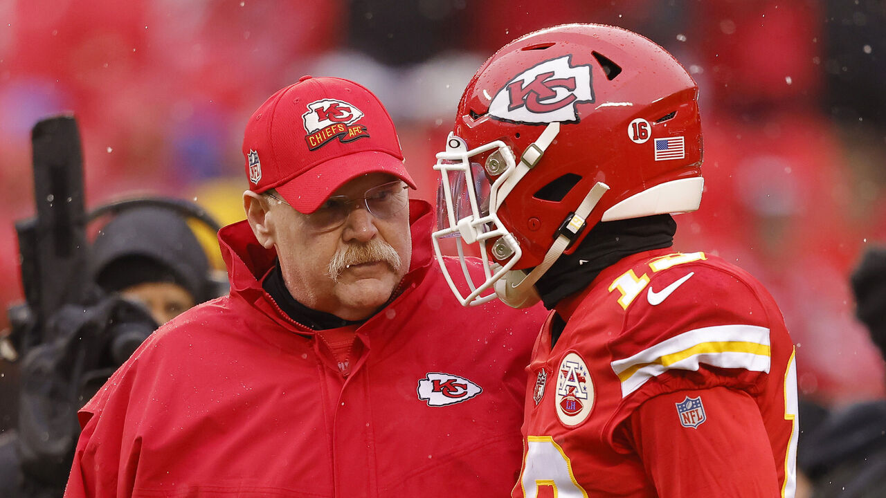 KANSAS CITY, MISSOURI - JANUARY 21: Head coach Andy Reid and Kadarius Toney #19 of the Kansas City Chiefs talk prior to the AFC Divisional Playoff game against the Jacksonville Jaguars at Arrowhead Stadium on January 21, 2023 in Kansas City, Missouri.