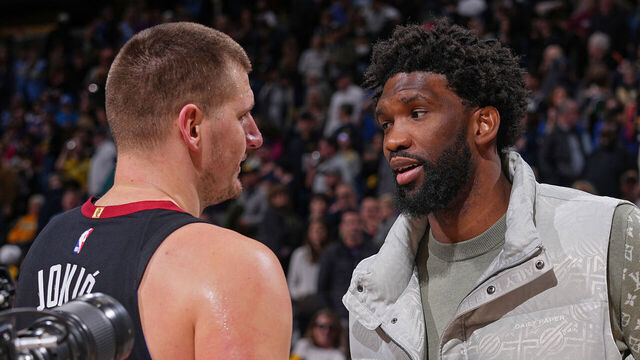 DENVER, CO - JANUARY 27: Joel Embiid #21 of the Philadelphia 76ers and Nikola Jokic #15 of the Denver Nuggets embrace after the game on January 27, 2024 at the Ball Arena in Denver, Colorado. NOTE TO USER: User expressly acknowledges and agrees that, by downloading and/or using this Photograph, user is consenting to the terms and conditions of the Getty Images License Agreement. Mandatory Copyright Notice: Copyright 2024 NBAE