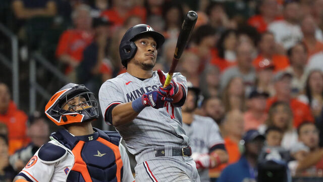 HOUSTON, TEXAS - OCTOBER 07: Jorge Polanco #11 of the Minnesota Twins hits a home run during the seventh inning against the Houston Astros during Game One of the Division Series at Minute Maid Park on October 07, 2023 in Houston, Texas.