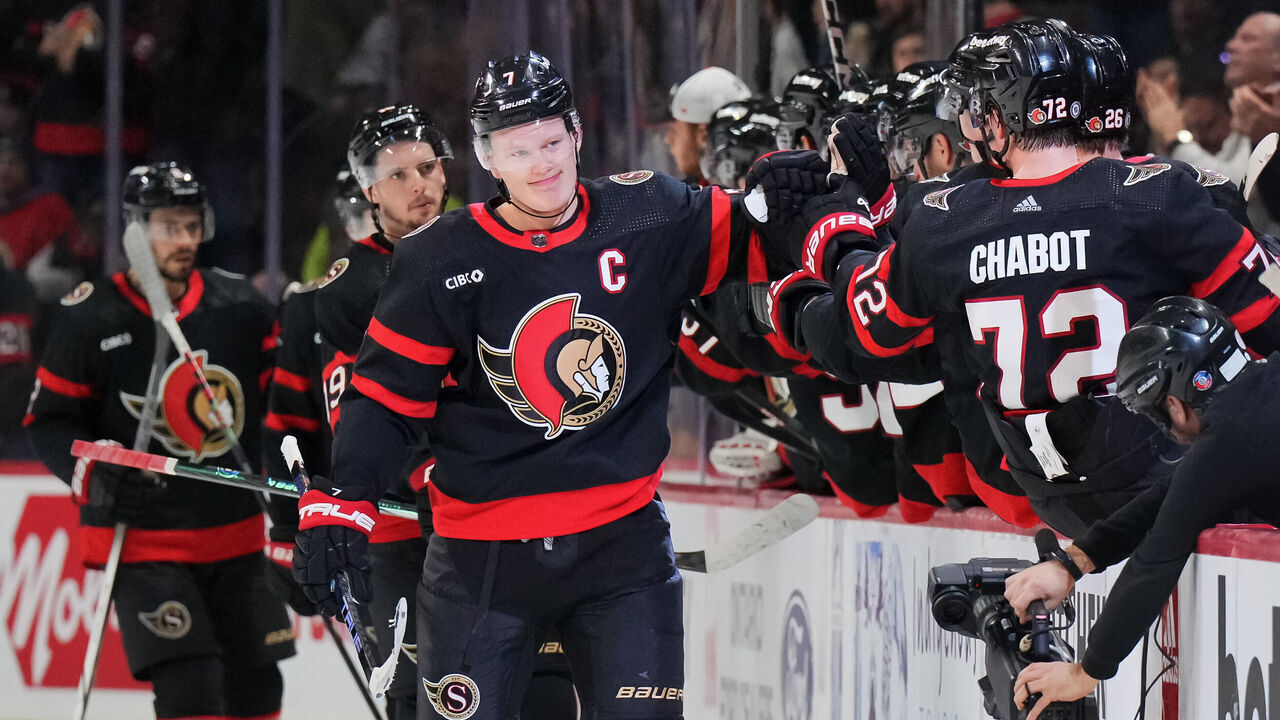 OTTAWA, CANADA - JANUARY 29: Brady Tkachuk #7 of the Ottawa Senators celebrates his second period goal against the Nashville Predators with teammates at the players' bench at Canadian Tire Centre on January 29, 2024 in Ottawa, Ontario, Canada.