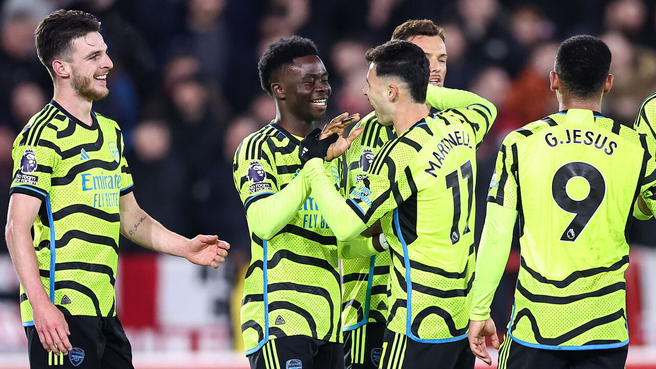 NOTTINGHAM, ENGLAND - JANUARY 30: Bukayo Saka of Arsenal celebrates scoring their 2nd goal with his teammates during the Premier League match between Nottingham Forest and Arsenal FC at City Ground on January 30, 2024 in Nottingham, England.