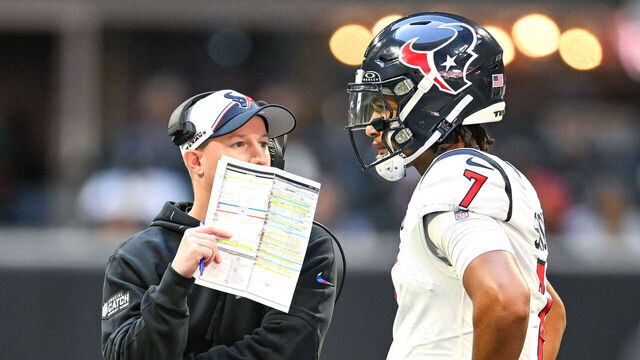 ATLANTA, GA OCTOBER 08: Houston quarterback C.J. Stroud (7) talks with offensive coordinator Bobby Slowik during the NFL game between the Houston Texans and the Atlanta Falcons on October 8th, 2023 at Mercedes-Benz Stadium in Atlanta, GA.