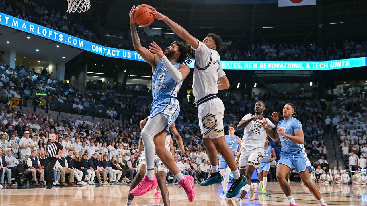 ATLANTA, GA JANUARY 30: Georgia Tech guard Kyle Sturdivant (1) blocks the shot of North Carolina guard RJ Davis (4) during the college basketball game between the North Carolina Tar Heels and the Georgia Tech Yellow Jackets on January 30th, 2024 at Hank McCamish Pavilion in Atlanta, GA.