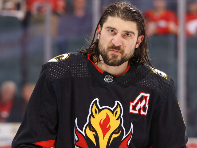 CALGARY, ALBERTA - DECEMBER 02: Chris Tanev #8 of the Calgary Flames skates before the game against the Vancouver Canucks at the Scotiabank Saddledome on December 02, 2023 in Calgary, Alberta.