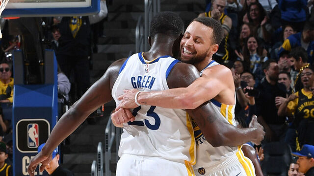 SAN FRANCISCO, CA - JANUARY 30: Stephen Curry #30 of the Golden State Warriors & Draymond Green #23 of the Golden State Warriors embrace during the game on January 30, 2024 at Chase Center in San Francisco, California. NOTE TO USER: User expressly acknowledges and agrees that, by downloading and or using this photograph, user is consenting to the terms and conditions of Getty Images License Agreement. Mandatory Copyright Notice: Copyright 2024 NBAE