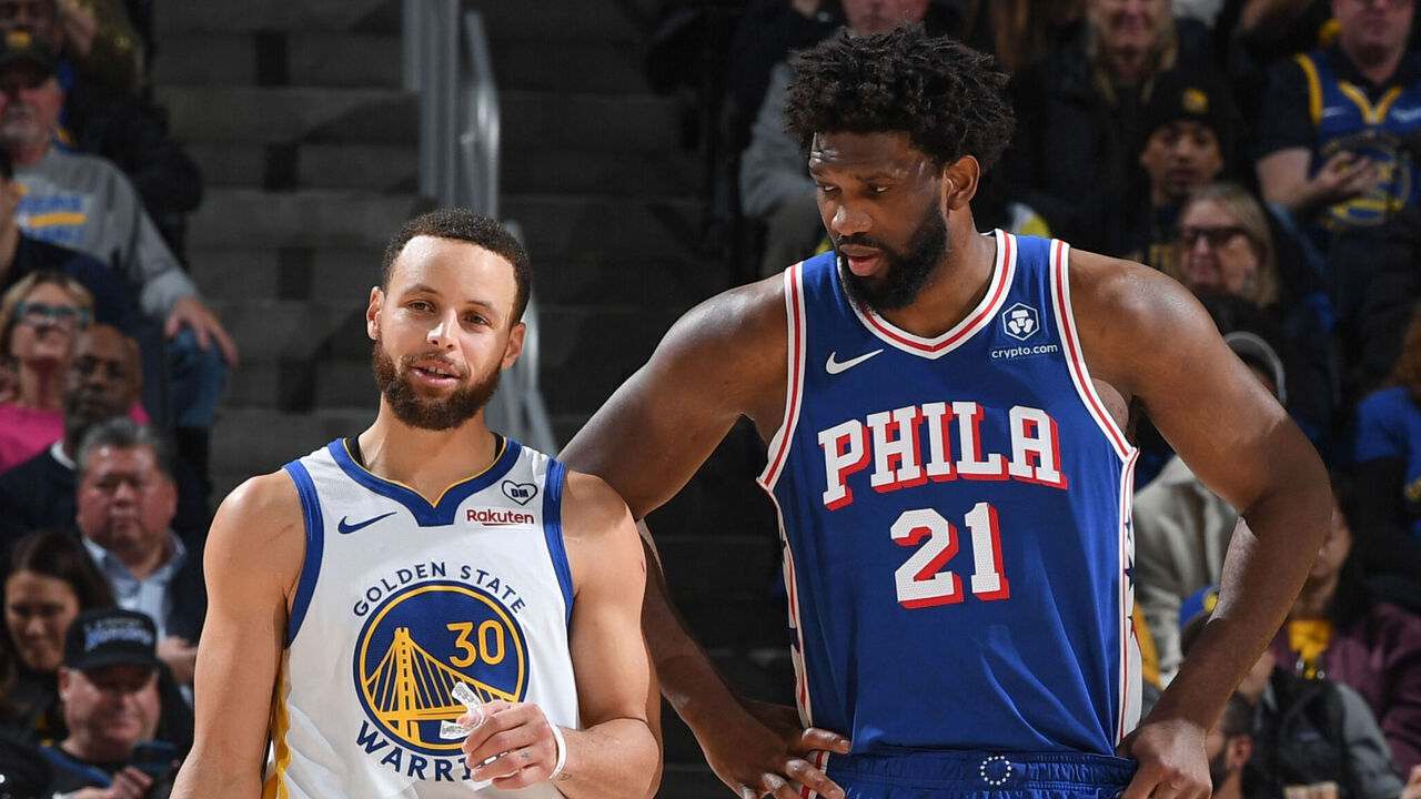 SAN FRANCISCO, CA - JANUARY 30: Stephen Curry #30 of the Golden State Warriors & Joel Embiid #21 of the Philadelphia 76ers look on during the game on January 30, 2024 at Chase Center in San Francisco, California. NOTE TO USER: User expressly acknowledges and agrees that, by downloading and or using this photograph, user is consenting to the terms and conditions of Getty Images License Agreement. Mandatory Copyright Notice: Copyright 2024 NBAE