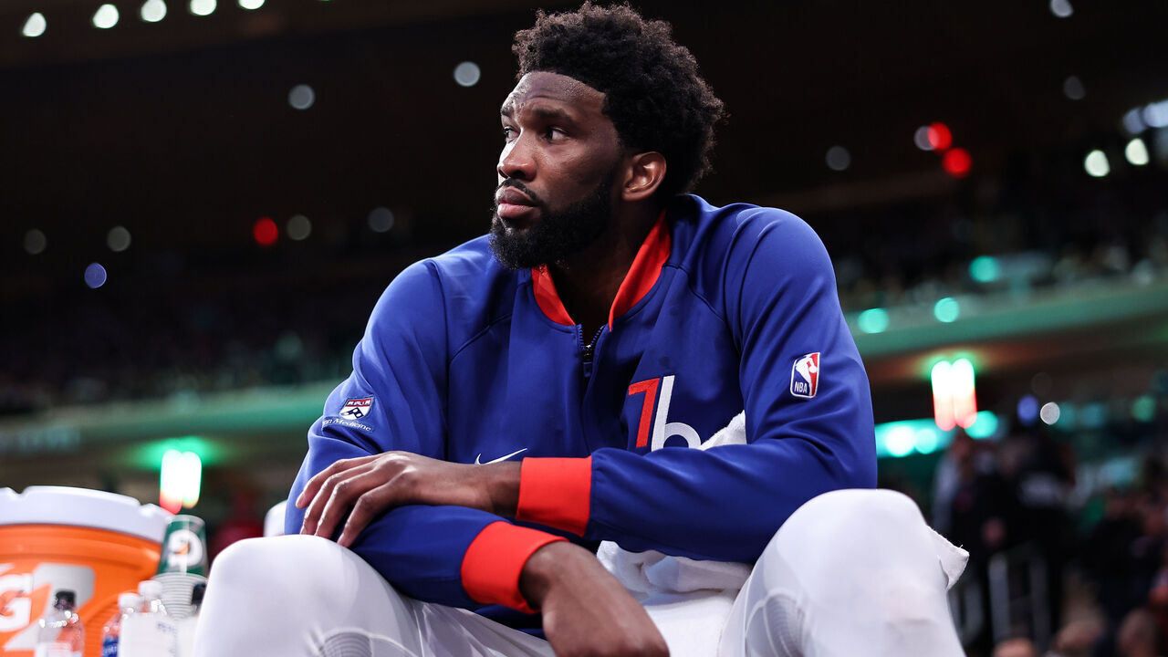 NEW YORK, NEW YORK - DECEMBER 25: Joel Embiid #21 of the Philadelphia 76ers looks on from the bench during the fourth quarter of the game against the New York Knicks at Madison Square Garden on December 25, 2022 in New York City.