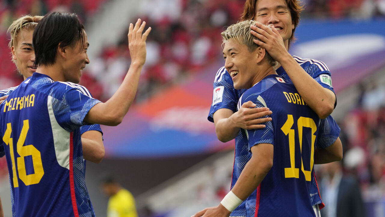 DOHA, QATAR - JANUARY 31: Ritsu Doan of Japan celebrates scoring his side's first goal during the AFC Asian Cup Round of 16 match between Bahrain and Japan at Al Thumama Stadium on January 31, 2024 in Doha, Qatar.