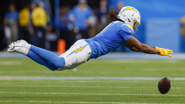 Inglewood, CA, Sunday, November 12, 2023 -Los Angeles Chargers wide receiver Quentin Johnston (1) leaps after the ball in frustration after dropping a pass from Justin Herbert in the second half against the Detroit Lions at SoFi Stadium. (Robert Gauthier/Los Angeles Times via Getty Images)