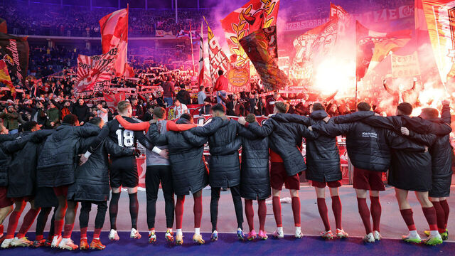 BERLIN, GERMANY - JANUARY 31: Players of 1. FC Kaiserslautern celebrate with the fans following the team's victory during the DFB cup round of 16 match between Hertha BSC and Hamburger SV at Olympiastadion on January 31, 2024 in Berlin, Germany.