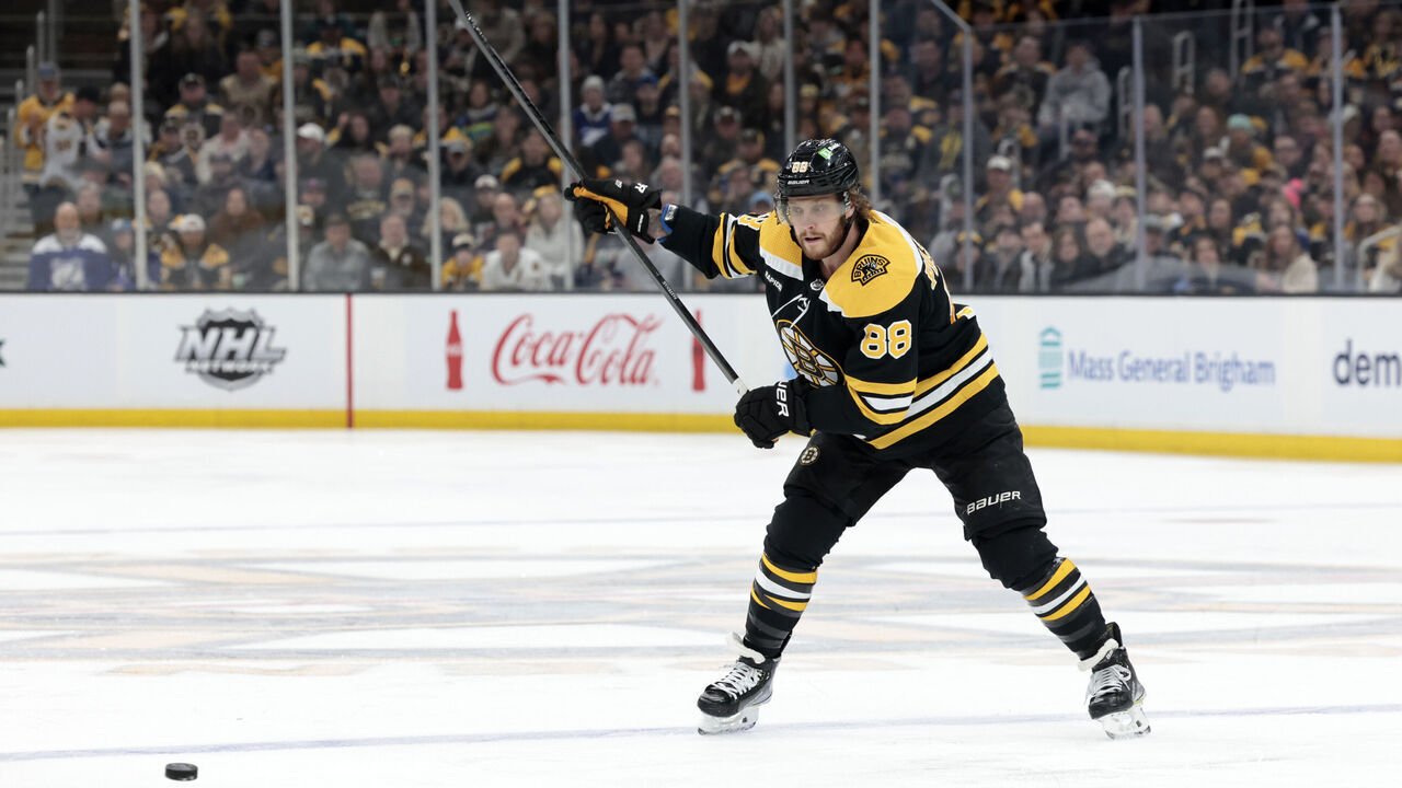 BOSTON, MA - MARCH 25: Boston Bruins right wing David Pastrnak (88) sets up a one-timer during a game between the Boston Bruins and the Tampa Bay Lightning on March 25, 2023, at TD Garden in Boston, Massachusetts.