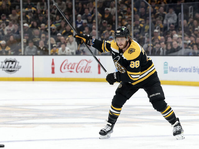 BOSTON, MA - MARCH 25: Boston Bruins right wing David Pastrnak (88) sets up a one-timer during a game between the Boston Bruins and the Tampa Bay Lightning on March 25, 2023, at TD Garden in Boston, Massachusetts.